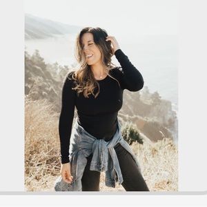 Carly Jean Los Angeles. Black Essentials long sleeve cropped top.